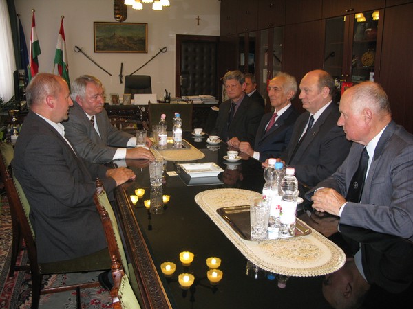A meeting of colleagues on the banks of the Danube River